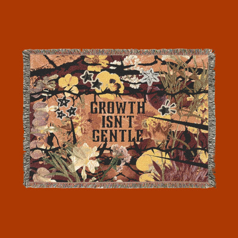 "growth isn't gentle" woven blanket
