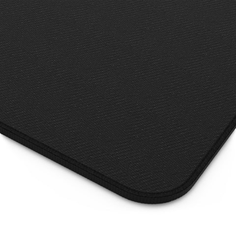"growth isn't gentle" desk mat