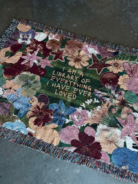 "library of everyone I loved" woven blanket