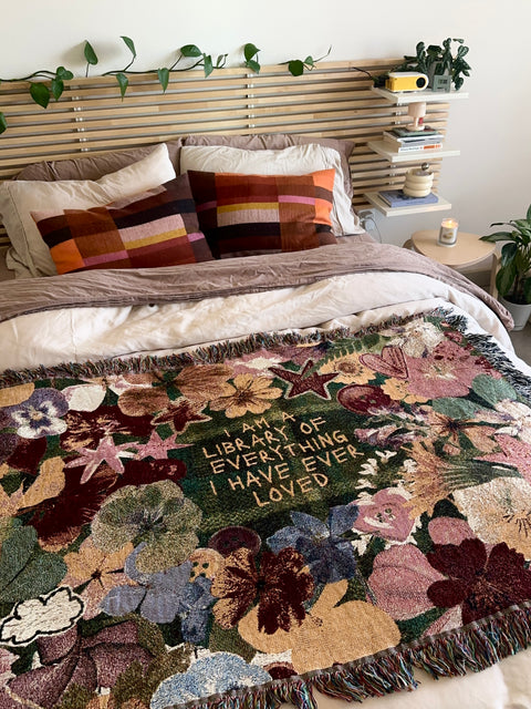 "library of everyone I loved" woven blanket