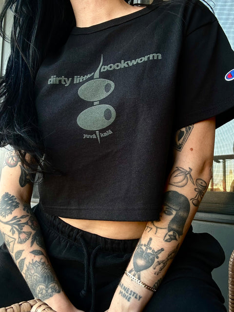 dirty little bookworm- champion cropped tee