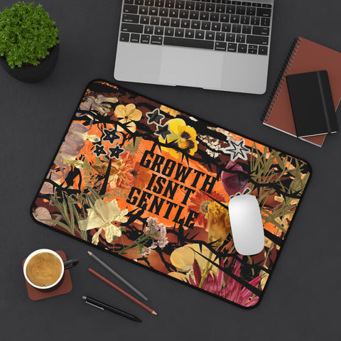 "growth isn't gentle" desk mat