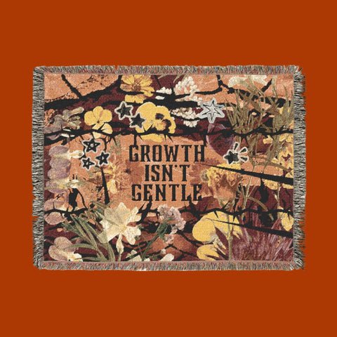 "growth isn't gentle" woven blanket
